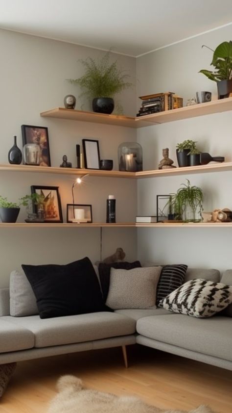 Corner Shelves Sofa, Corner Floating Shelves Dining Room, Living Room Extra Wall Ideas, Shelves In Corner Living Room, Utilizing Vertical Space, Living Room Full Wall Shelves, Flat Lounge Ideas, Vertical Shelves Living Room, Bookshelf Corner Living Room