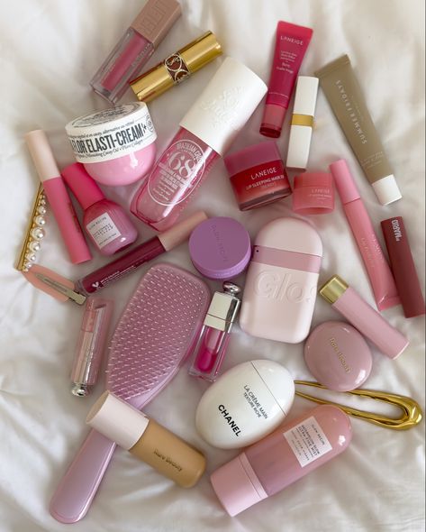 An assortment of different pink beauty products, including items from Chanel, Sol de Janeiro, Glow Recipe, and more. Makeup Contouring, Makeup Bag Essentials, Fancy Makeup, Pretty Skin Care, Skin Care Items, Soft Makeup, Pink Girly Things, Makeup Obsession, Pink Makeup