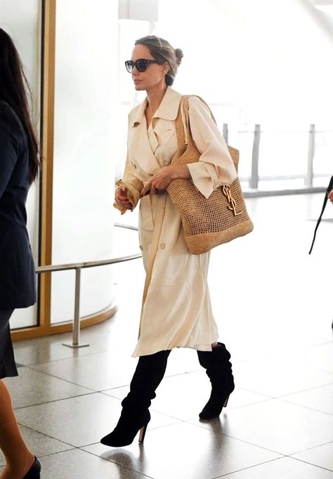 Angelina Jolie Brings Airport Style to a Fashionable Fever Pitch Angelina Jolie Style, Fever Pitch, Fashion Newsletter, Nude Pumps, Smart Casual Outfit, Airport Fashion, White Coat, Celebrity Street Style, Style Crush