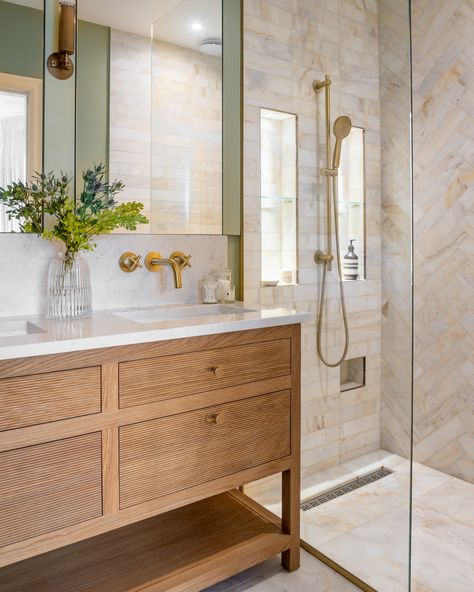 Classic elegance meets functionality in this master bathroom by @christianasyrrisdesign, featuring our Italian 4 Drawer Vanity Unit. With a warm natural wood finish, ribbed drawer panels, and sleek brass accents, this piece brings both style and storage to the space. Photo by: @chriswakefield.photography Mandarin Stone, Drawer Vanity, Green Tile, Outdoor Tiles, Natural Wood Finish, Instagram Editing, Vanity Unit, Family Bathroom, Brass Accents