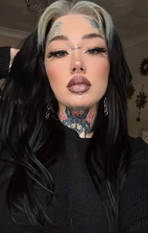 Girl with face and neck tattoo
Facial piercings Bridge Of Nose Piercing, Bridge Piercing Chain, Bridge Nose Piercing, Bridge Piercing Jewelry, Nose Chain Piercing, Nose Piercing Chain, Goth Eyebrows, Piercing Bridge, Nose Bridge Piercing