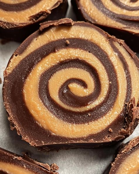 No-Bake Chocolate Peanut Butter Pinwheel Fudge Peanut Butter Pinwheel Fudge, Chocolate Peanut Butter Pinwheel Fudge, Chocolate Peanut Butter Swirl Fudge, Pinwheel Fudge, Peanut Butter Pinwheels, Chocolate Pinwheel Cookies, No Bake Fudge, Pinwheel Design, Peanut Butter Fudge Easy