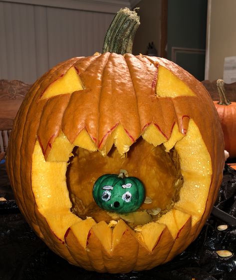 Hope you enjoy this idea it is a big pumpkin eating a tiny pumpkin!!❤️🎃 Halloween Pumpkins Carvings Designs, Biggest Pumpkin, Pumkin Carving, Pumpkin Carving Designs, Small Pumpkins, Halloween Pumpkins Carvings, A Pumpkin, Pumpkin Carving, Halloween Pumpkins