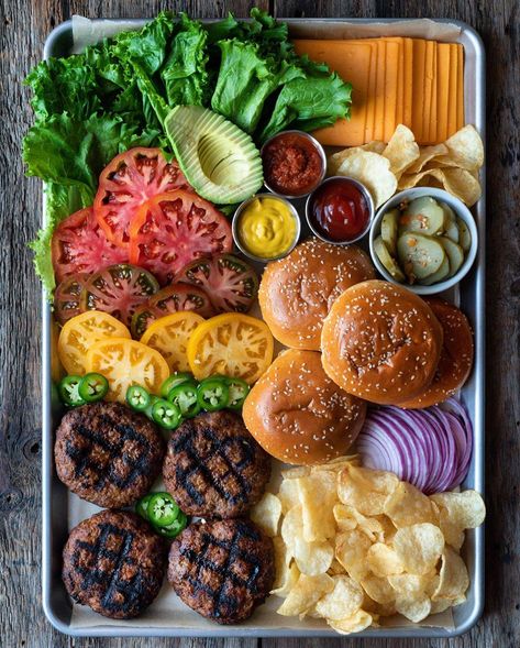 Homemade, grilled 6 1/2 oz. beef burgers. Cheese, double cheese, no cheese, bun or protein style, heirloom tomatoes, red onions, jalapeños, avocado, lettuce, spicy pickles, mustard, ketchup or habanero horseradish? What's on your burger? Burger Tray, Burger Platter, Healthy Recipes Snacks, Summer Dinner Recipes Grill, Perfect Burger, Veal Recipes, Bbq Burgers, Recipes Snacks, Charcuterie Inspiration