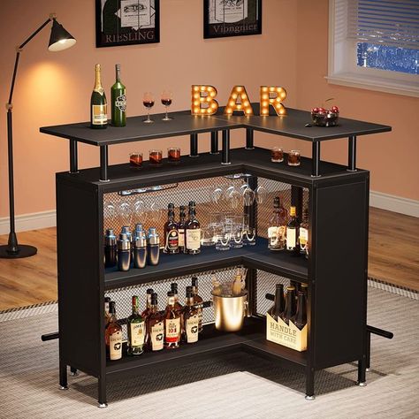 Home bar unit with a powerful storage function. 2-tier storage shelves to can store dozens of spirits, mixers, and 2 built-in stemware racks that hold up to 12 wine glasses or champagne flutes. Corner Bar Ideas, Home Bar Unit, L Shape Bar, Liquor Cabinet Bar, Bar Table Design, Corner Bar Cabinet, L Shaped Bar, Bar For Home, Coin Bar