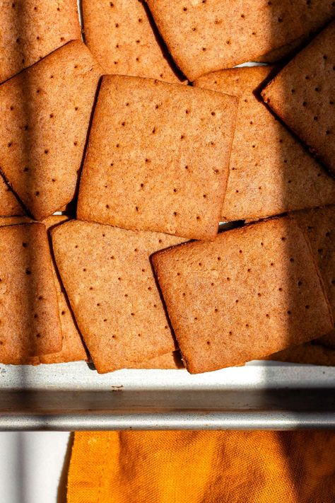 These honey cinnamon sourdough graham crackers are fermented overnight for easier digestion and the best flavor. You can use sourdough discard or an active starter. Kids love these perfectly crispy, wholesome, and delicious cinnamon graham crackers! #sourdough #grahamcrackers #crackers Sourdough Gram Crackers, Discard Graham Crackers, Sourdough Discard Graham Crackers, Sourdough Graham Crackers, Cinnamon Sourdough, Use Sourdough Discard, Cinnamon Graham Crackers, Sourdough Crackers, Gram Crackers