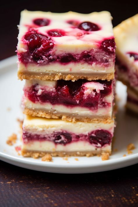 Holiday Cheesecake Bars, Cranberry Bars With Cream Cheese, Christmas Cherry Cheese Bars, Mini Cranberry Cheesecakes, Lemon Cranberry Cheesecake Bars, Christmas Cheesecake Bars, Cheesecake With Sugared Cranberries, Easy Cranberry Cheesecake, Cranberry Crumble Cheesecake Bars