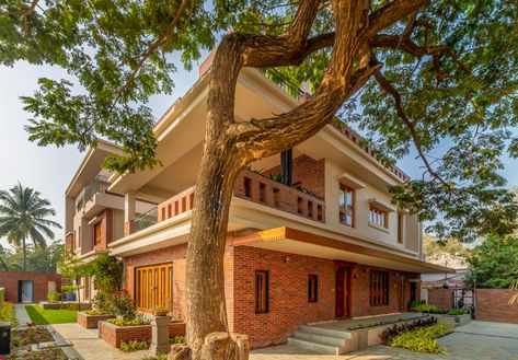 Traditional Indian Elegant House with Spirit of an Outdoor-Indoor Design | RNK Studio - The Architects Diary Indian Farmhouse Design, Indian Farmhouse, Gray Floor Tiles, Traditional Indian Houses, House Elevations, Indian House Exterior Design, Farmhouse Design Ideas, Indian House Design, Indian Houses