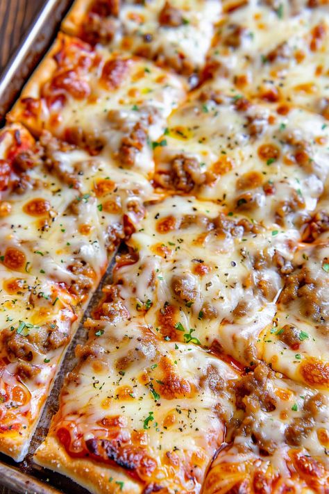 Relive childhood memories with our Homemade School Cafeteria Pizza recipe. Enjoy a thick, airy crust topped with gooey cheese and your favorite toppings. Pastrami Pizza Recipe, Homemade Sausage Pizza, Make Ahead Pizza, Pizza Toppings Ideas, School Cafeteria Pizza Recipe, Slow Cooker Country Style Ribs, School Cafeteria Pizza, Country Style Ribs Recipe, Cafeteria Pizza