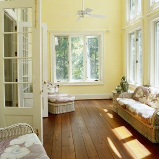 Home Decor - Sun Room - Decoration Ideas - Good Housekeeping  Open up front living room wall to connect to sunporch Four Seasons Room, Three Season Room, Sunroom Decorating, Sunroom Designs, Florida Room, Lots Of Windows, Yellow Room, Yellow Walls, Porch Patio