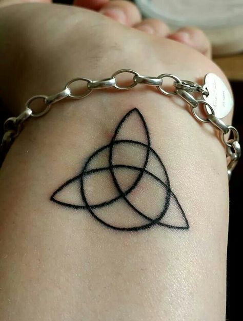 Triquetra tattoo on wrist Ancient Symbols Tattoo, Welsh Tattoo, Triquetra Tattoo, Celtic Tattoo For Women, Trinity Knot Tattoo, Hand Tattoo Ideas, Celtic Knot Tattoo, Celtic Cross Tattoos, Simple Tattoos For Women