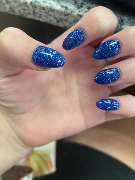 Blue Nails Ideas Sparkle, Mamma Mia Nails Acrylic, Sparkly Blue Nails Acrylic, Blue Glitter Almond Nails, Mamma Mia Nails Ideas, Blue Nails Sparkle, Blue Nails With Sparkles, Blue Glittery Nails, Glittery Blue Nails