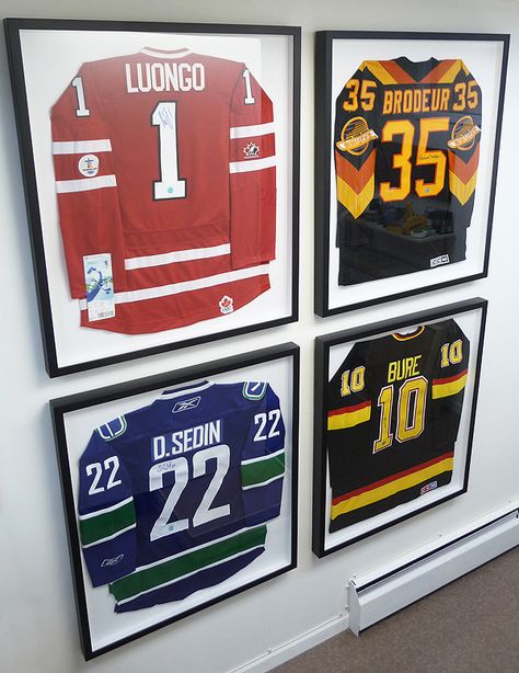 Display Hockey Jersey, Hockey Jersey Wall Display, Framed Sports Memorabilia, Hockey Jersey Frame, Jersey Wall Display Man Cave, Sport Jersey Display Ideas, Sports Memorabilia Display Ideas Framed Jersey, Hockey Man Cave Ideas, Basketball Jersey Frame