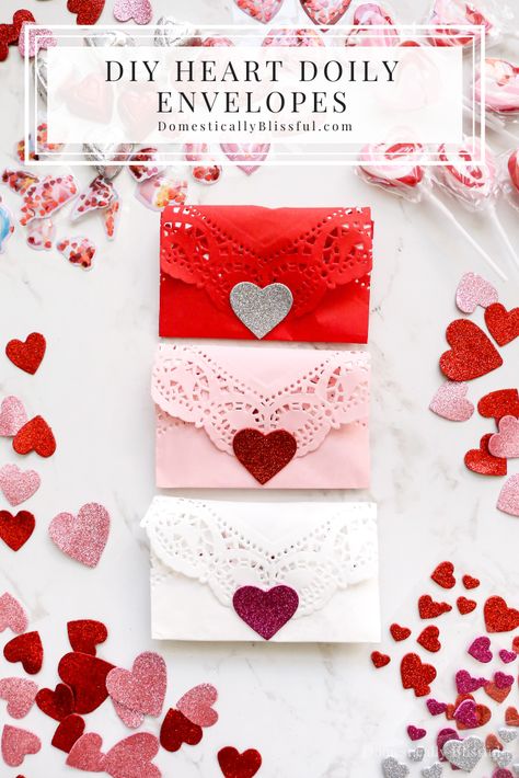 How cute are these DIY Heart Doily Envelopes!? We used dollies in a variety of ways for our wedding (nearly 12 years ago), from the invitations to the popcorn snack bar. And since Valentine's is right around the corner, I thought it would be fun to create these DIY Heart Doily Envelopes while reminiscing about all the doilies we used all those years ago. I bought most of the materials I needed for this craft from the dollar store, so it's super budget-friendly while being absolutely adorable! Popcorn Snack Bar, Paper Doily Crafts, Heart Doily, Valentines Envelopes, Trending Crafts, Valentine's Day Decorations, Easy Valentine Crafts, Doilies Crafts, Valentines Pillows