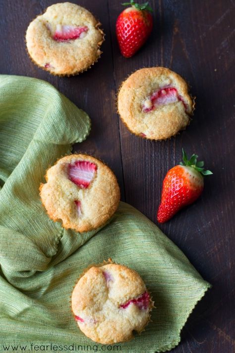 Gluten Free Strawberry Muffins on a table with strawberries Gluten Free Muffins Easy, Gluten Free Strawberry Muffins, Cookies Sans Gluten, Fluffy Muffins, Strawberry Muffin Recipes, Strawberry Gluten Free, Recipes Strawberry, Strawberry Muffins, Gluten Free Recipes For Breakfast