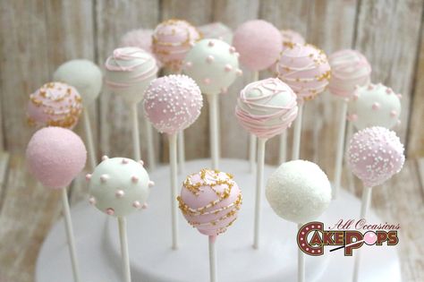 Simple white, pink, and gold cake pops🎀 Pink White And Gold Cake Pops, Pink And Gold Cakepops, Cake Pops Pink And Gold, First Birthday White Theme, White And Pink Cake Pops, Cake Pops First Birthday, Pink And White Birthday Theme, First Birthday Cake Pops, Pink And White Cupcakes