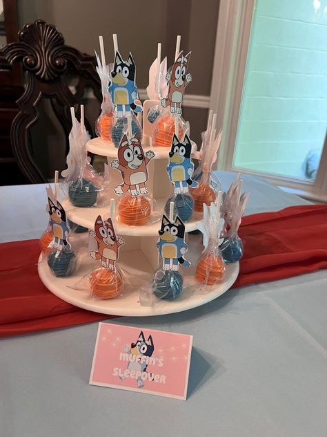 Bluey Birthday Pretzels, Bluey Birthday Cakepops, Bluey Party Dessert Table, Bluey Themed Desserts, Bluey Birthday Party Ideas Girl Centerpiece, Bluey Party Desserts, Bluey Birthday Candy Table, Bluey Birthday Party Desserts, Bluey Birthday Dessert Table