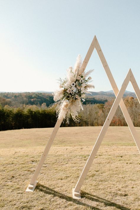 Photobooth Wedding Ideas, Triangle Wedding Arbor, Mountain Boho Wedding, Wedding Table Backdrop Ideas, Biblical Declarations, Engagement Party Backdrop, Boho Mountain Wedding, Floating Down The River, Arbor Arch