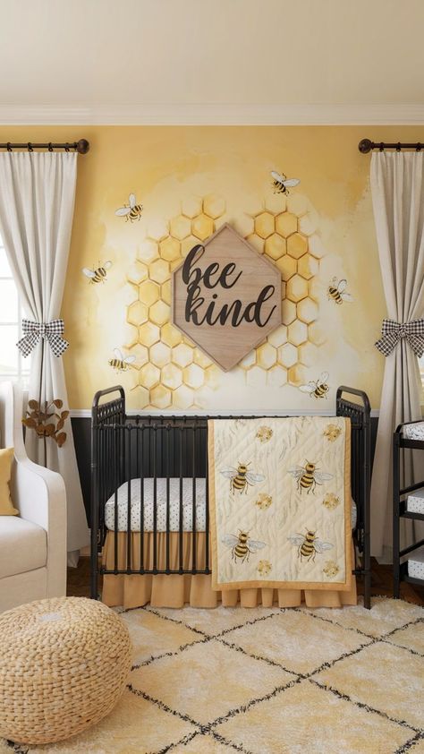 A bee-themed baby girl nursery featuring a honeycomb mural with a “Bee Kind” wooden sign, a black metal crib with bee-patterned bedding, soft yellow accents, and gingham curtain bows. The design is bright, playful, and inviting. Honeycomb Accent Wall, Baby Girl Nursery Ideas, Girl Nursery Ideas, Nursery Inspiration Girl, Black Crib, Girl Nursery Themes, Name Wall Decor, Sweet Baby Girl