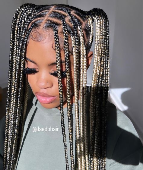 Blond And Black Braids Black Women, Blonde Skunk Stripe Knotless Braids, Small Black And Blonde Knotless Braids, Blonde Braided Hairstyles Black Women, Medium Thigh Length Knotless Braids, Black Braids With Highlights, Peakaboobraids Black And Blonde, Black And Blonde Box Braids Mixed, White Peekaboo Braids