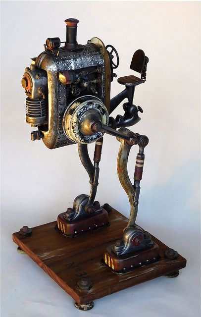 By Dan Jones | Tinkerbots | Flickr Game Lounge, Steampunk Machines, Steampunk Robots, Recycled Robot, Steampunk Vehicle, Steampunk Artwork, Robot Sculpture, Retro Robot, Steampunk Decor