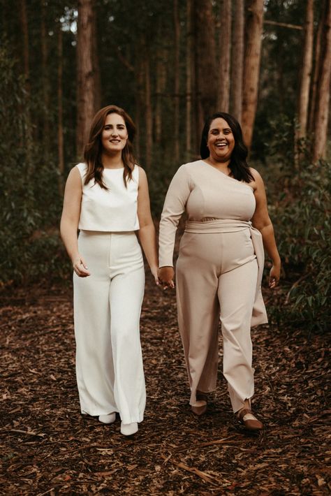 ALYCE & KATE // #wedding #realwedding #weddingplanning #weddinginspiration #weddinginspo #australianwedding #weddingphotographer #weddingphotography #westernaustralia #wawedding #fashion #coolbride #bride #realbride #bridalstyle #bridalsuit #style #pantsuit #jumpsuit #bridalpantsuit #bridaljumpsuit Lesbian Bride Suit, Bride Pant Suit White Jumpsuit, Bridal Crop Top And Pants, Lesbian Wedding Jumpsuit, Classic Single-breasted Wedding Pantsuit, Wedding Pantsuit The Bride, Bridesmaid Pantsuit, Bridesmaid Suit, Bridal Pant Suit