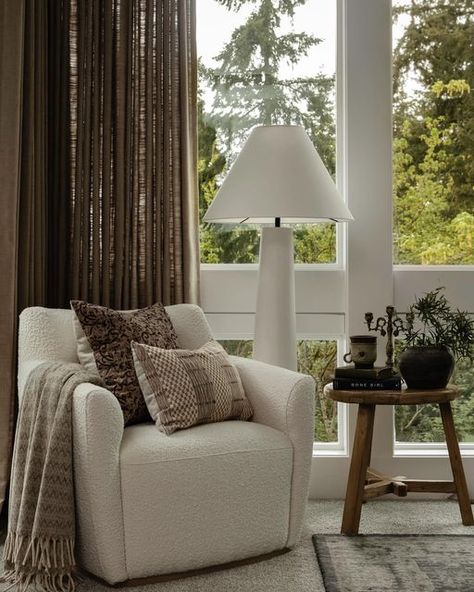 Ayesha Usman on Instagram: "Today is a perfect fall day here in Seattle to curl up on a cozy chair with a good book and coffee. This is my favorite corner from this master bedroom install. Happy Friday y’all 🤍 Photography: @sumairaamberphoto Design & Styling: @ayeshausmandesign Project: #bellevuemoderncasa #masterbedroom #thatroomiseverything #cozyhome #falldecor #friday #frodayvibes #mycuratedaesthetic #mycurlymethod #interiordesign #seattleinteriordesign #mymidcenturymix #styleathome #des Corner Armchair, Seattle Interior Design, Book And Coffee, Perfect Fall Day, Armchair Bedroom, Bedroom Nook, Dream Life House, Warm Interior, Cozy Chair