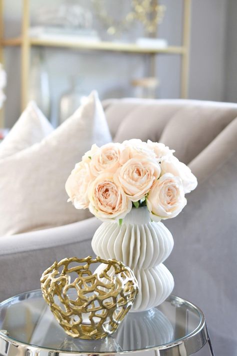 Get the look for your side table with affordable fake roses from Afloral.com. Image by @designbyoccasion #fauxroses #artifificalroses #livingroom