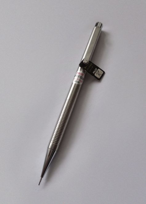 PILOT – 2020 stainless slim mechanical pencil HFT-100S-S. Stainless steel body with shaker advance mechanism, circa 1980s. '2020' is pronounced 'fure-fure' in Japanese, meaning 'shake'. Japanese Mechanical Pencils, Best Mechanical Pencil, Japanese Meaning, Pencil Png, Travel Art Kit, Drawing Instruments, Wood Bed Design, Pretty Pens, Pen Collection