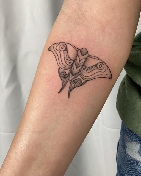 Black fine line moth tattoo on a woman’s upper forearm Tlou Moth, The Last Of Us Moth, Moth Tattoo On Arm, Mule Tattoo, Tattoos Moth, Tattoos On Arm, Luna Moth Tattoo, Moth Tattoos, Moth Tattoo