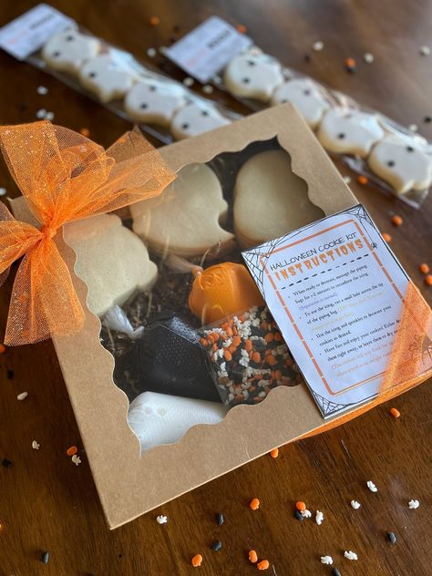 **Deadline to order 10/24/21** PICKUP INFORMATION Location: Quail Run Park (3199 N Glacier Way, Hanford, CA 93230) Time: 3:00 - 6:00 PM --------------------------------------------------------------------------------------------------- Included in DIY Cookie Kit : - 12 Large Vanilla Sugar Cookies (4 Pumpkin Pales, 4 Witches' Cauldrons, 4 Ghosts)  - 3 Bags of Icing (Orange, Black, White)  - Sprinkles - Instructions Included in Bag of Boos:  - 4 Mini (2.5in) Iced Vanilla Sugar Cookies --------------------------------------------------------------------------------------------------- Text (559) 381-8350 with any questions.  Thank you in advance for your order!  - Nini :) Halloween Cookie Boxes Diy, Halloween Cookie Kit Ideas, Halloween Cookie Gift Boxes, Diy Halloween Cookie Kits, Halloween Diy Cookie Kits, Fall Cookie Box Ideas, Halloween Cookie Box Ideas, Thanksgiving Cookie Kits, Halloween Cookie Decorating Kit