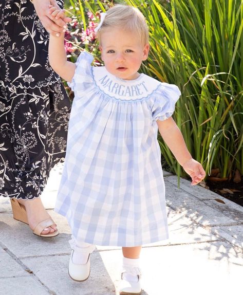 Our beautiful hand-smocked, custom items take 8-12 weeks to be delivered. We can not expedite this timeline and by purchasing this item, you agree to the timeline described. Custom, handmade smocked big blue gingham dress with puff sleeve. Each is made just for you. Instead of a name, could also say "Big Sister", "Happy Birthday" or your own unique wording! PLEASE NOTE: As these items take time to make, expect delivery in 8-12 weeks. Take timing into consideration when ordering sizes. Items purc Baby Smocked Outfits, Sister Happy Birthday, Smocked Baby Clothes, Blue Gingham Dress, Smocked Baby Dresses, Smocked Clothes, Monogram Outfit, Southern Outfits