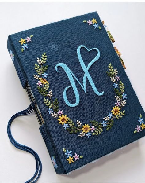 For anyone interested in owning a piece of this magic, making an order today is the first step. A new chapter awaits with these exquisite, hand-embroidered journals. Dairy Cover Design Ideas, Dairy Cover Design Diy, Diary Cover Design, Fashion Illustration Collage, Cover Books, Book Cover Diy, Diary Covers, Hand Sewing Projects, Hand Embroidery Patterns Flowers