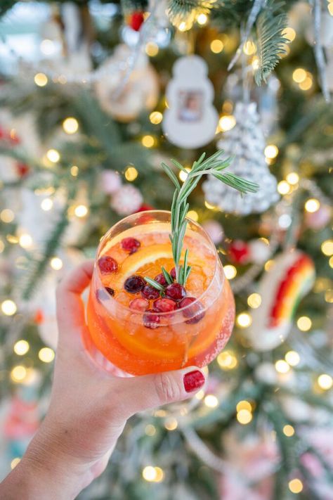 I love Aperol Spritz cocktails and I am sharing our favorite winter Aperol Spritz that you'll love! It's perfect for your holiday parties, celebrations and even new years! Check out this post for all the details. Spritz Cocktails, Aperol Spritz Recipe, Spritzer Recipes, Spritz Recipe, Festive Cocktails, Winter Cocktails, Festive Drinks, Christmas Cocktails, Christmas Cocktails Recipes