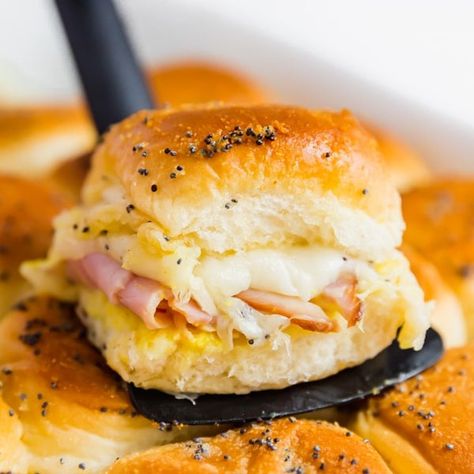 Make these easy Baked Ham and Cheese Sliders for your next party and watch as your friends fight for seconds! Made with ham, Swiss cheese, Hawaiian rolls and honey mustard sauce, these are sure to be a hit at a party or game day gathering! Baked Ham And Cheese Sliders, Sauce For Broccoli, Ham Sliders, Ham And Cheese Sliders, Ham And Swiss, Cheese Sliders, Potato Dinner, Easy Meatloaf, Honey Mustard Sauce