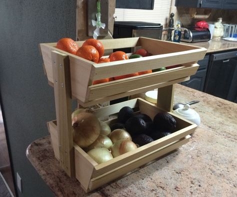 I have been wanting to make something simple to hold all my fruits and veggies, so I quickly built a very easy wooden storage rack. Visit my website for other DIY/woodworking projects! Kids Woodworking Projects, Desk Diy, Woodworking Projects Furniture, Pallet Project, Woodworking Projects For Kids, Woodworking For Kids, Fruit Storage, Woodworking Projects That Sell, Diy Holz