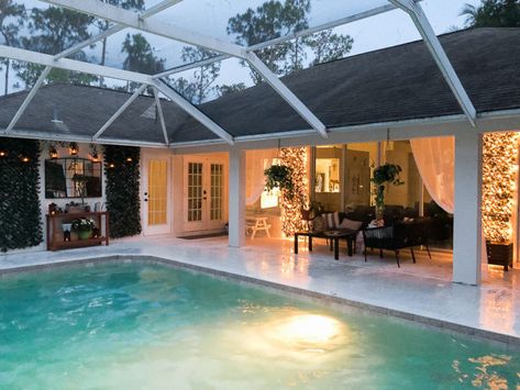 Blank patio turned plant-filled retreat | House Mix Pool Screen Lighting Ideas, Pool Lanai Lighting Ideas, Florida Pool Ideas With Cages, Pool Cage Decor Ideas, Florida Patio Ideas Screened Pool, Back Porch Pool Ideas, Screened In Pool House, Pool Enclosure Decorating Ideas, Pool With Lanai