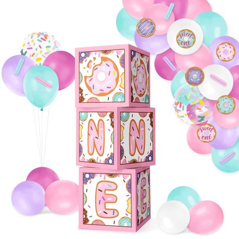 PRICES MAY VARY. 【Sweet One Pastel Centerpieces Boxes with Donut Cutouts】Package includes 3 pcs boxes, 36 pcs latex balloons, 1 pcs transparent balloon chain, and 6 pcs donut paper cutouts. Ready for a yummy sweet one donut party. 【Donut Baby First Birthday Cake Smash Decor】These ONE blocks will meet your requirements for a cute baby's first birthday party. Especially for your little princess. You'll get many compliments if you treat them as cake smash photo props backdrop decor. 【Big Size Block Kids Party Favor Ideas, Donut Birthday Party Decorations, Boxes Decoration, Donut Party Decorations, Baby First Birthday Themes, Baby First Birthday Cake, Donut Birthday Parties, Balloon Box, One Balloon