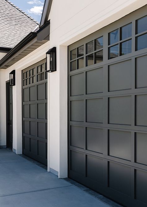 Shaker Style Garage Doors, Black Exterior Garage Doors, Modern Farmhouse Garage Doors, Dark Garage Doors, Tudor Garage, Duplex Remodel, Garage Front Door, Tudor Exterior, Black Garage Door