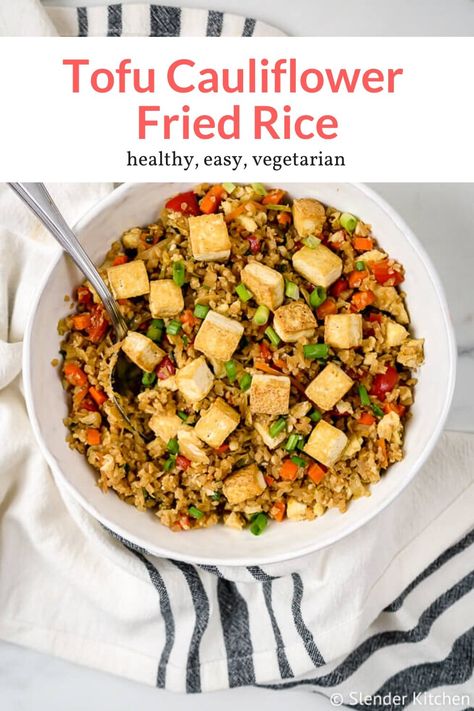 The most amazing vegetarian cauliflower fried rice with crispy tofu makes for healthy takeout at home. This healthy recipe from Slender Kitchen is MyWW SmartPoints compliant and vegetarian. #quickandeasy #sidedish #dinner Tofu Cauliflower, Healthy Takeout, Takeout At Home, Kitchen Favorites, Slender Kitchen, Cauliflower Fried, Cauliflower Rice Recipes, Veggie Meals, Rice Dinner