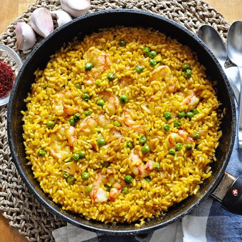 Spanish Saffron Rice with Garlic Shrimp Recipe - Spain on a Fork Spanish Seafood Paella, Seafood Paella Recipe, Spanish Saffron, Paella Recipe Seafood, Spanish Rice Recipe, Seafood Rice, Lemon Garlic Shrimp, Saffron Rice, Seafood Paella