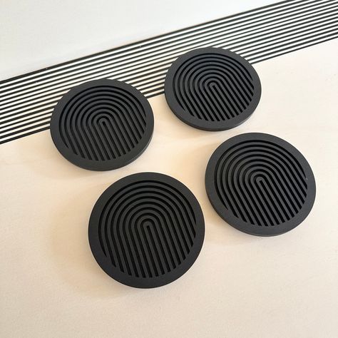 Introducing our set of 4 black geometric coasters, perfect for protecting your furniture while adding a touch of modern style to any room. Each coaster is lovingly handmade in Milton Keynes, England from sustainable plywood and laser cut to create a unique and striking design.Our coasters are crafted from two pieces of wood, with the top layer featuring a geometric cutout design and the bottom layer left plain black. Each coaster is approximately 11.5cm in diameter and 8mm thick (plus extra for Laser Cut Furniture, Geometric Coaster, Laser Cut Decor, Corporate Event Design, Black Coasters, Modern Coasters, 3d Printed Objects, Gadgets Technology Awesome, Cnc Design