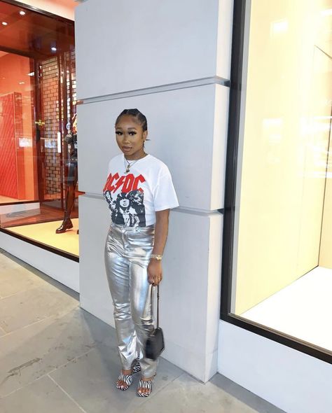 Silver Pants Outfit Baddie, Silver Boots Concert Outfit, White Sliver Outfit, Silver Bottoms Outfit, Outfits With Metallic Pants, Outfits With Silver Pants, Metallic Pants Outfit Black Women, Metallic Outfit Ideas Black Women, Silver Skirt Outfit Black Women