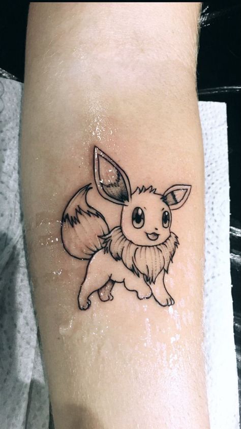 Eevee And Pikachu Tattoo, Simple Eevee Tattoo, Pokemon Tattoo Evie, Pokemon Tattoo Cute, Eevee Tattoo Ideas, Evee Tattoos, Eevee Tattoo Design, Pokemon Minimalist Tattoo, Tattoo Ideas Pokemon