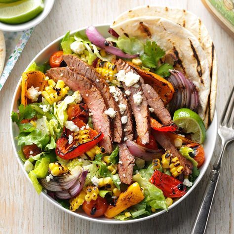 Fajita in a Bowl Recipe -Pull out the skewers and take a stab at grilling peppers, onions and corn for an awesome steak salad that’s all summer and smoke. —Taste of Home Test Kitchen, Milwaukee, Wisconsin Sirloin Salad, Recipes For Steak, Tomatillo Dressing, Fajita Salad, Steak Salad Recipe, Beef Flank Steak, Bean Salsa, Grilled Peppers, Taco Salad Recipes