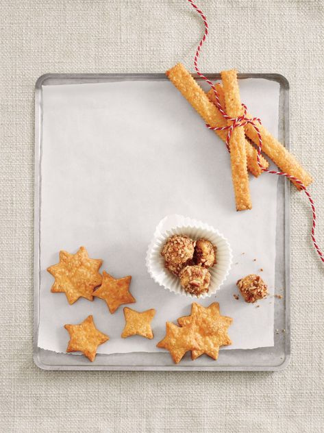 The Tastiest Light Thanksgiving Appetizers To Keep Hungry Relatives Entertained Cornbread Cookie, Savory Crackers, Cheese Straw, Cheese Straws Recipe, Party Mix Snacks, Southern Living Recipes, Savory Cheese, Crispy Cheese, Cheese Straws