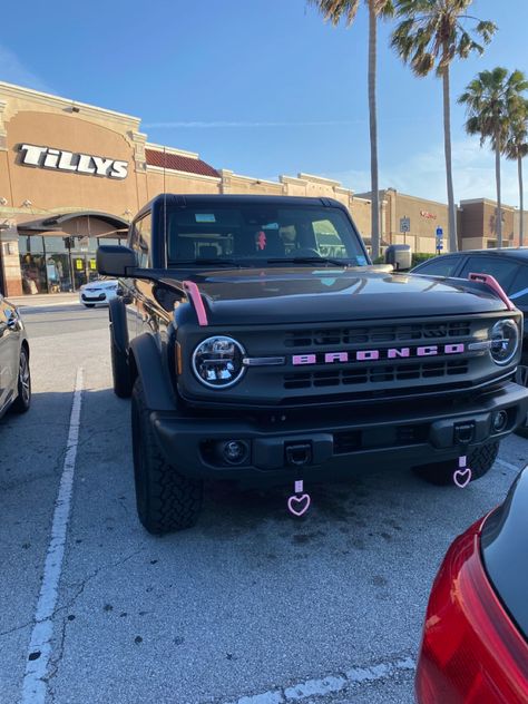 Car Inspo Exterior, Black Bronco Aesthetic, Blacked Out Bronco, White Bronco With Pink Accents, Pink Bronco Sport, Black Bronco With Pink Accents, All Black Bronco, Hot Pink Bronco, New Ford Bronco Aesthetic