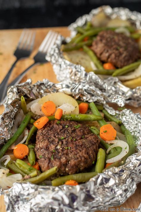 Blackstone Hobo Dinner Recipe - grillonadime.com Blackstone Ideas, Hobo Dinner Recipes, Hobo Dinner, Blackstone Cooking, Grilled Dinner Recipes, Hobo Dinners, Beef Recipe Instant Pot, Foil Pack Dinners, Foil Packet Dinners