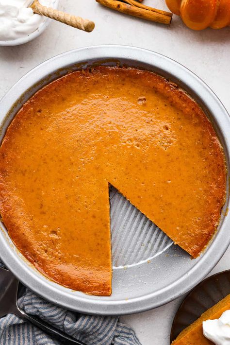 Crustless pumpkin pie has rich spices, creamy pumpkin, and a perfectly smooth texture. The custard holds its shape beautifully. Whether you're keeping things simple or exploring a gluten-free option, this pie gives all the nostalgic vibes of the classic. Pumpkin Pie Crustless, Crustless Pumpkin Pie Recipe, Impossible Pumpkin Pie, Pies Dessert, Dessert Bar Recipes, Thanksgiving Pie Recipes, Crustless Pumpkin Pie, Leftover Pumpkin, Traditional Pumpkin