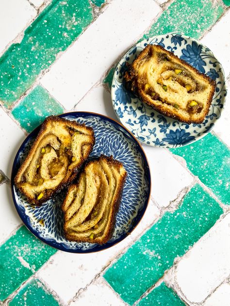 I love the flavours found in baklava. The warming cinnamon and cardamom, the slightly almondy flavour of the pistachios and sweetness from golden honey. For this recipe, I have played around with those flavours to create a Baklava Babka recipe. A spiced almond and pistachio filling twisted and plaited amongst pillow-soft enriched dough to create a babka, which then gets a honey and cinnamon syrup lashed over the top once baked. Incredibly moreish and one slice really isn't enough. Baklava Babka, Pistachio Filling, Babka Recipe, Chocolate Babka, Cinnamon Syrup, Golden Honey, Ground Almonds, Honey And Cinnamon, Chocolate Baking